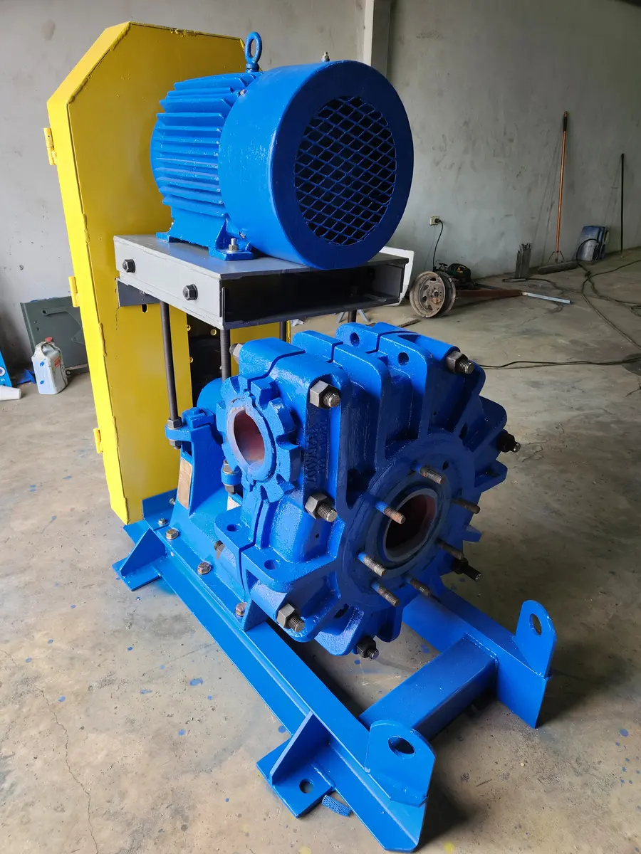 Refurbished slurry pump with repainted casing, motor on a fabricated base and a yellow guard