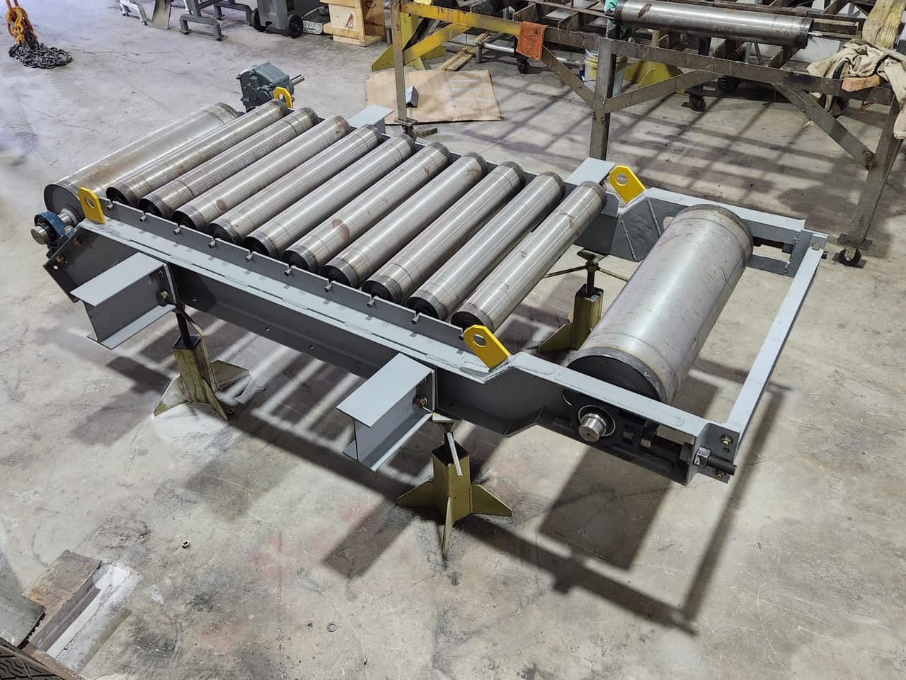 Roller conveyor section on a fabricated steel frame